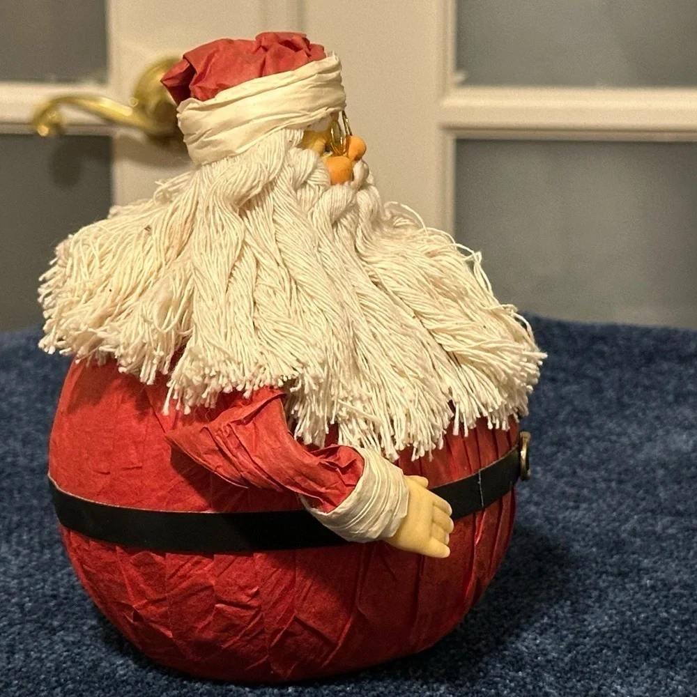 Delightful round Santa made with paper. Very cute!